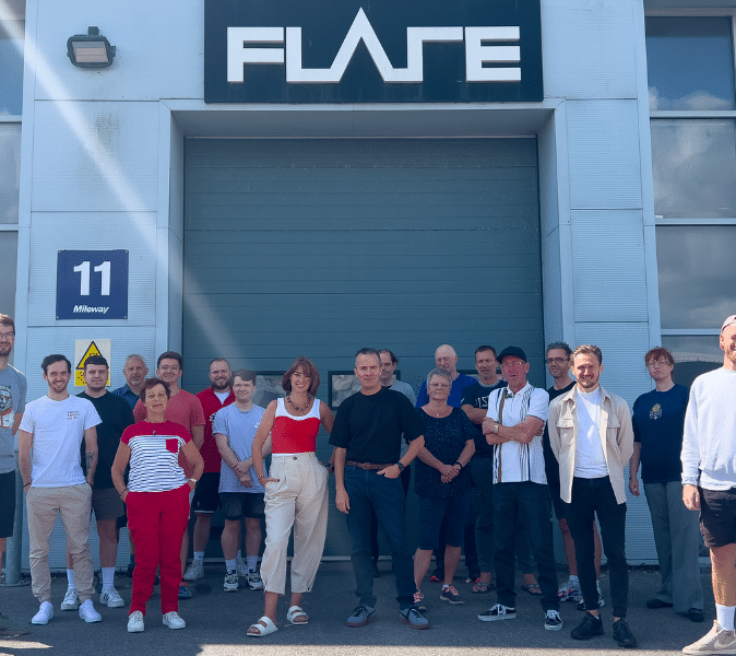 Flare Audio team at their workspace in Lancing